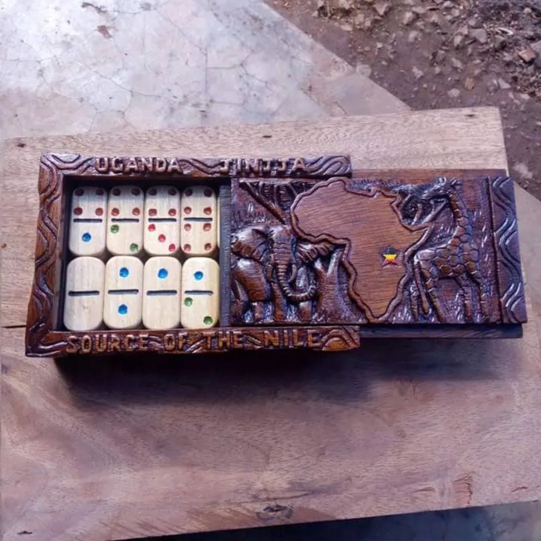 Carved wooden domino box by Silver reading Uganda Jinja, Source of the Nile, with elephant and giraffe
